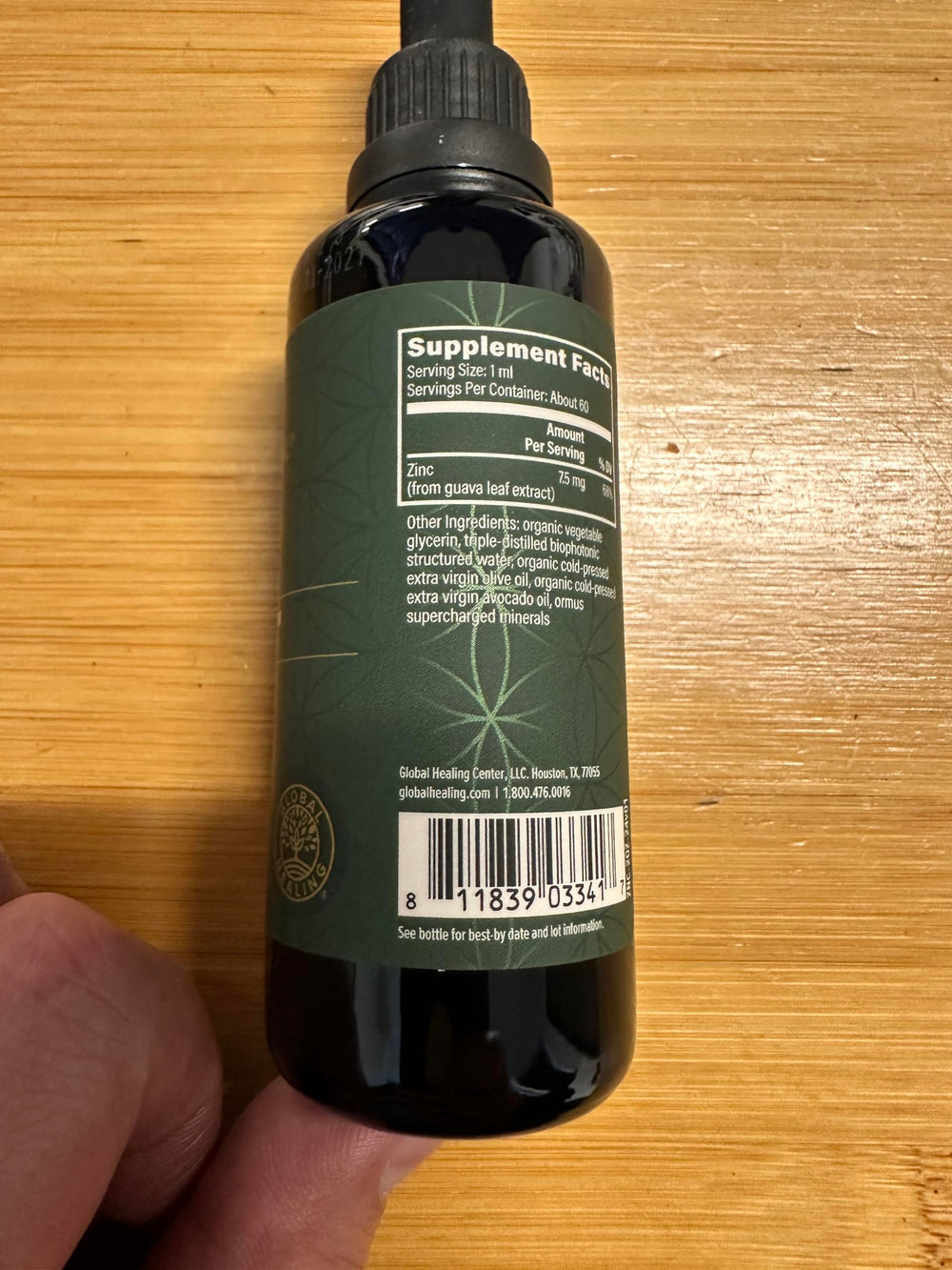 Global Healing Center zinc liquid vegan badge indicating plant-based formula.