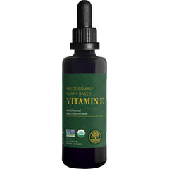 Global Healing Vitamin E liquid drops bottle highlights vegan, skin-supporting formula.
