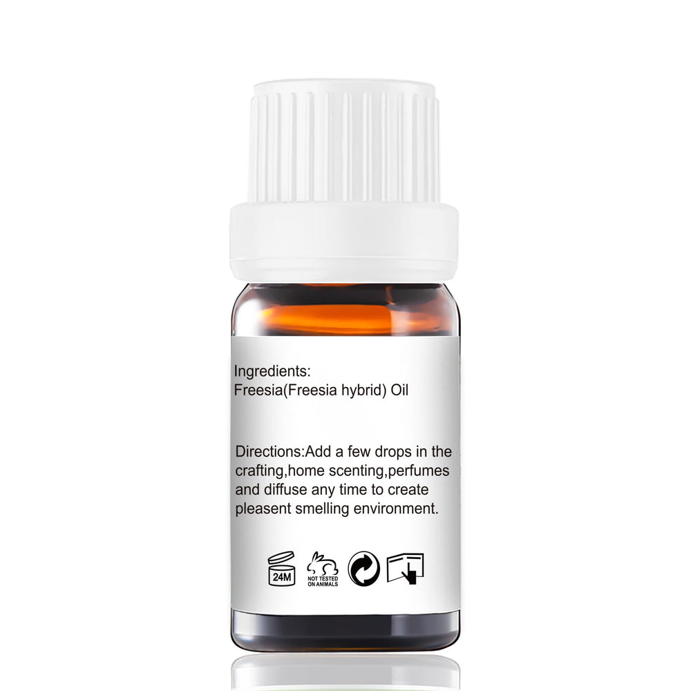 GM Gumili Freesia essential oil bottle label shows purity and scent