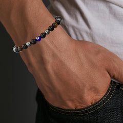 Gnamy Hematite and Obsidian beads show elastic fit for most wrists.