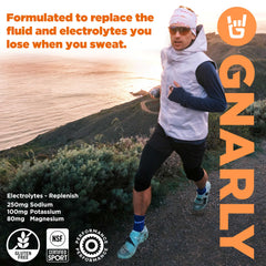 Close-up of the orange pineapple flavor label with NSF certification.