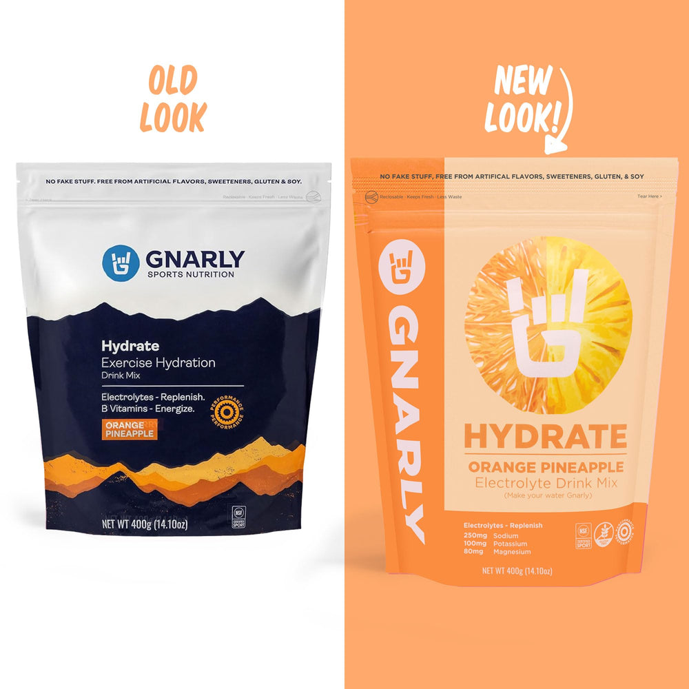 Gnarly Hydrate orange pineapple scoop in water showing easy mix.