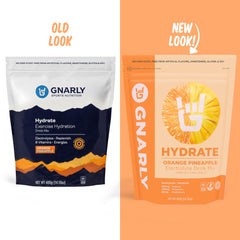 Gnarly Hydrate orange pineapple scoop in water showing easy mix.