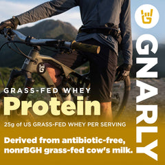 Creamy chocolate protein shake poured into a glass beside Gnarly tub