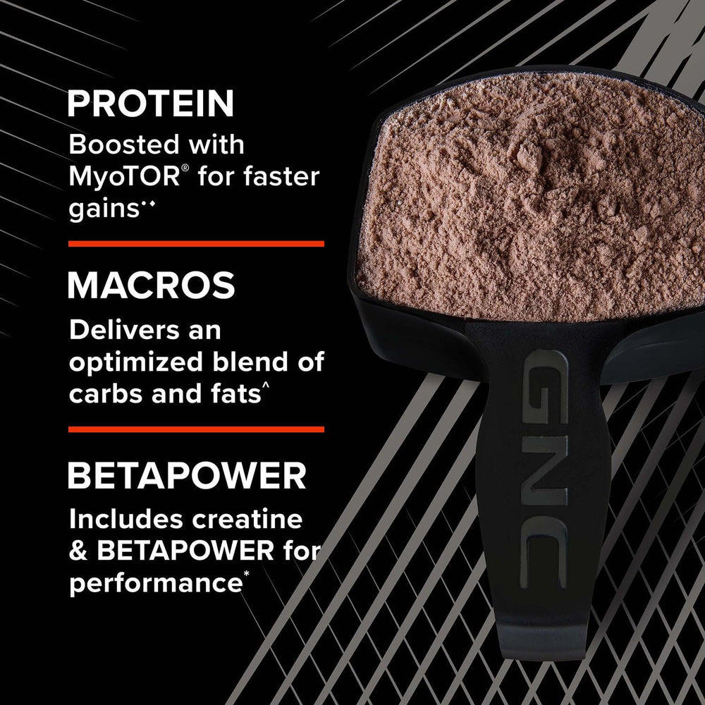 GNC AMP Mass XXX shaker cup with powder ready for mixing.