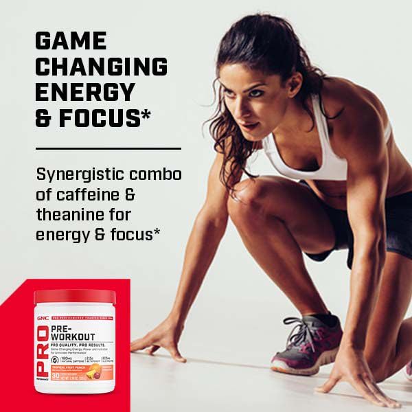 GNC Pro Performance Pre-Workout glass with blue raspberry mix ready