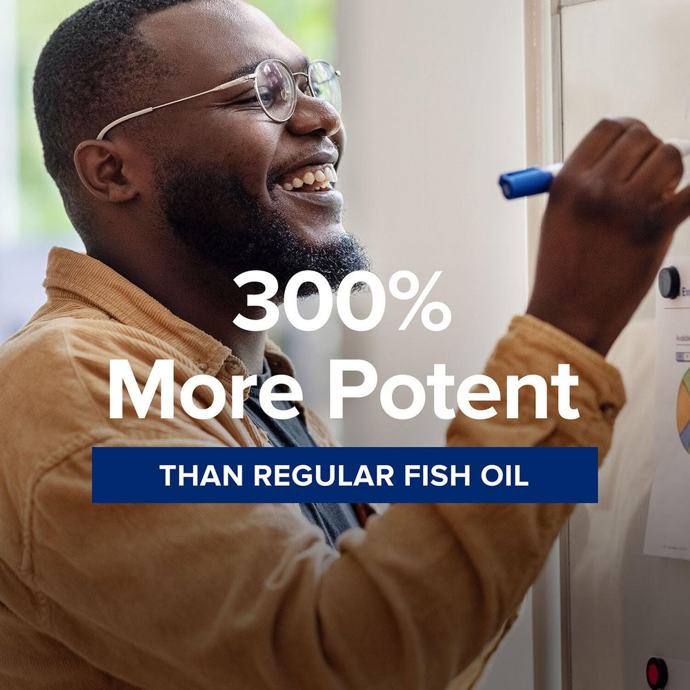 GNC Triple Strength Fish Oil mini bottle being poured for portability
