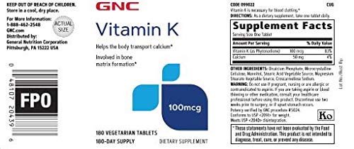 GNC Vitamin K 100mcg tablets close-up for easy daily supplementation