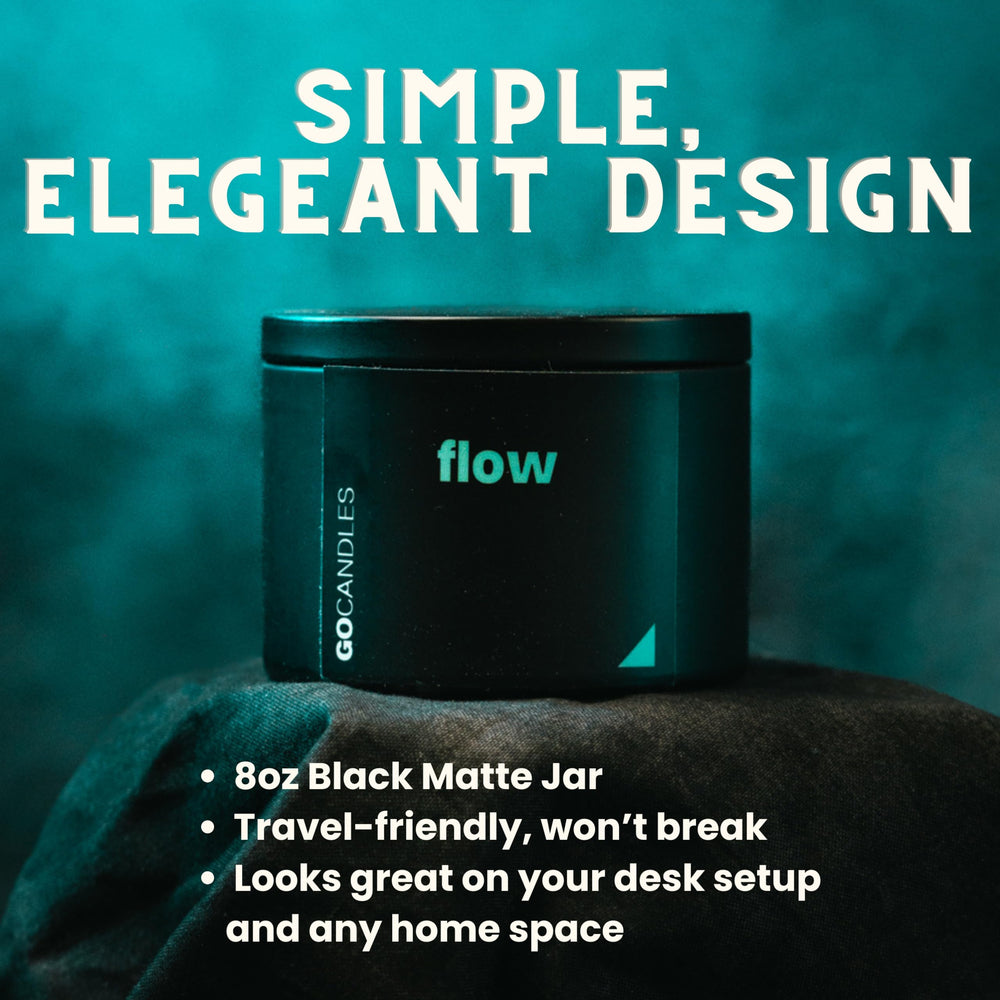GO CANDLES Flow large lid-open view in a sleek black tin for the desk