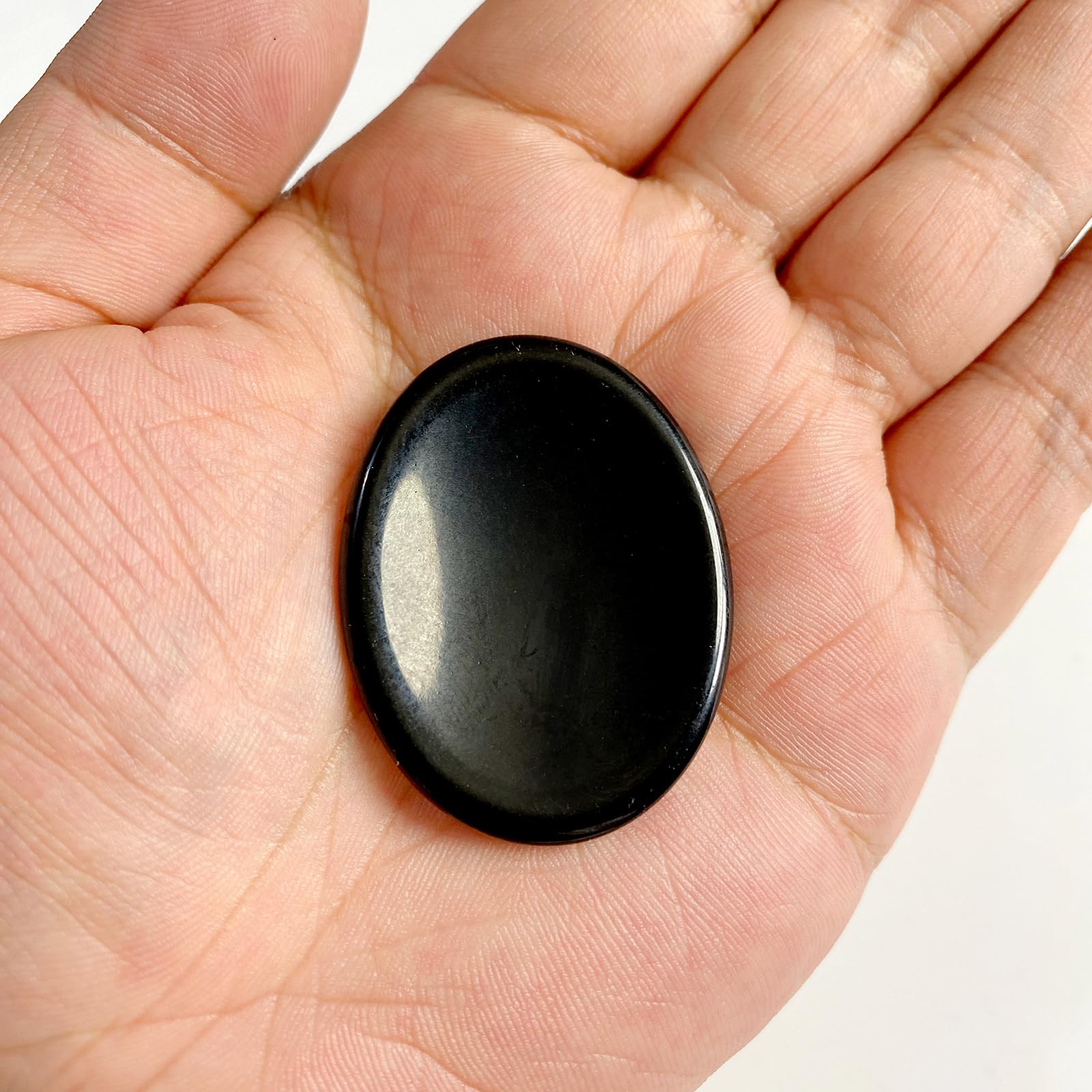 GolbalJew Obsidian thumb stone in hand for quick calm moments