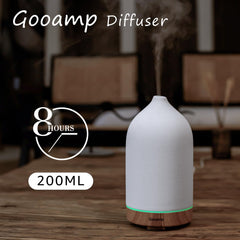 Gooamp diffuser displaying 7-color LED mood lighting for ambient scenes during yoga