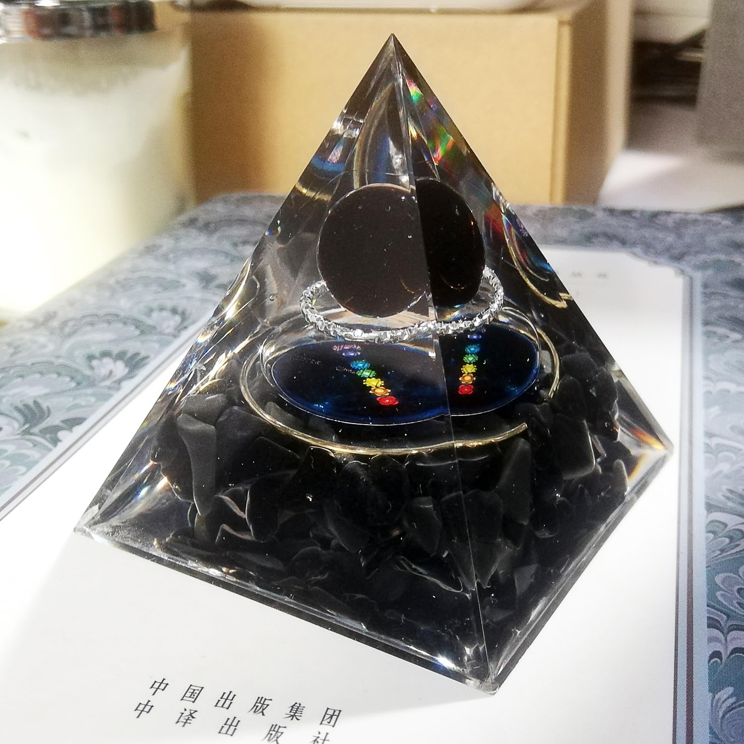 Gosyfeti Orgone Pyramid as desk decor adds mysterious charm to spaces.