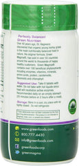 Green Foods Green Magma tablets close-up emphasizing compact daily format