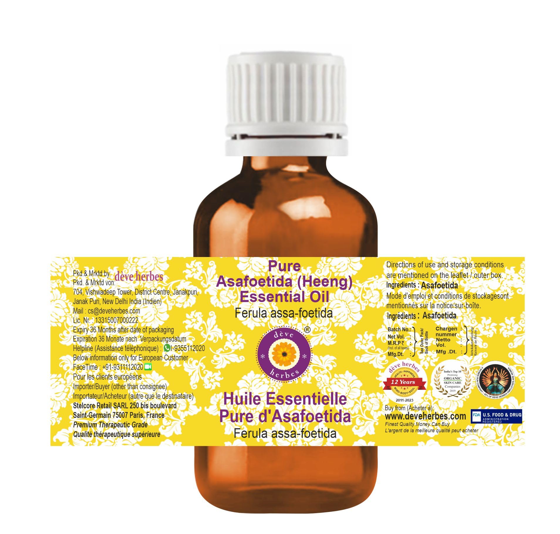 Closeup of Greenwood Essential Asafoetida oil highlighting amber glass and purity.