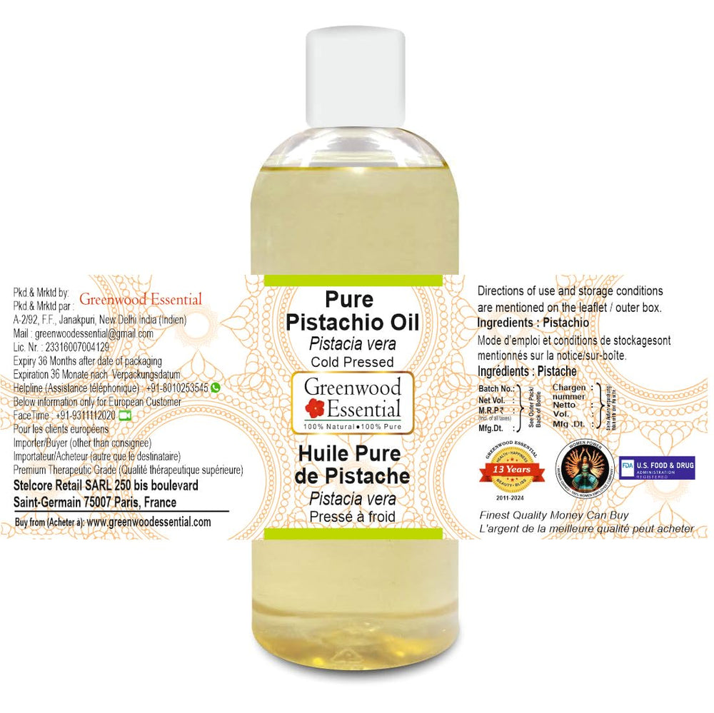 Greenwood Essential Pistachio Oil label closeup highlighting cold pressed purity.