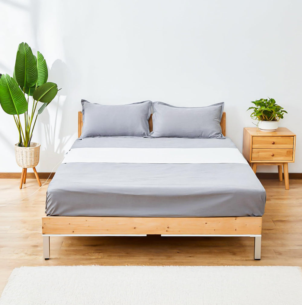 GroundingWell grounding sheet connects to a grounded outlet for calmer nights.