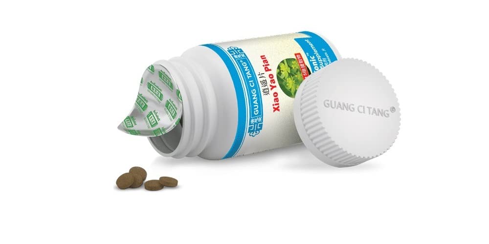 Guang Ci Tang Xiao Yao Pian packaging highlighting natural herbal blend for balanced energy.