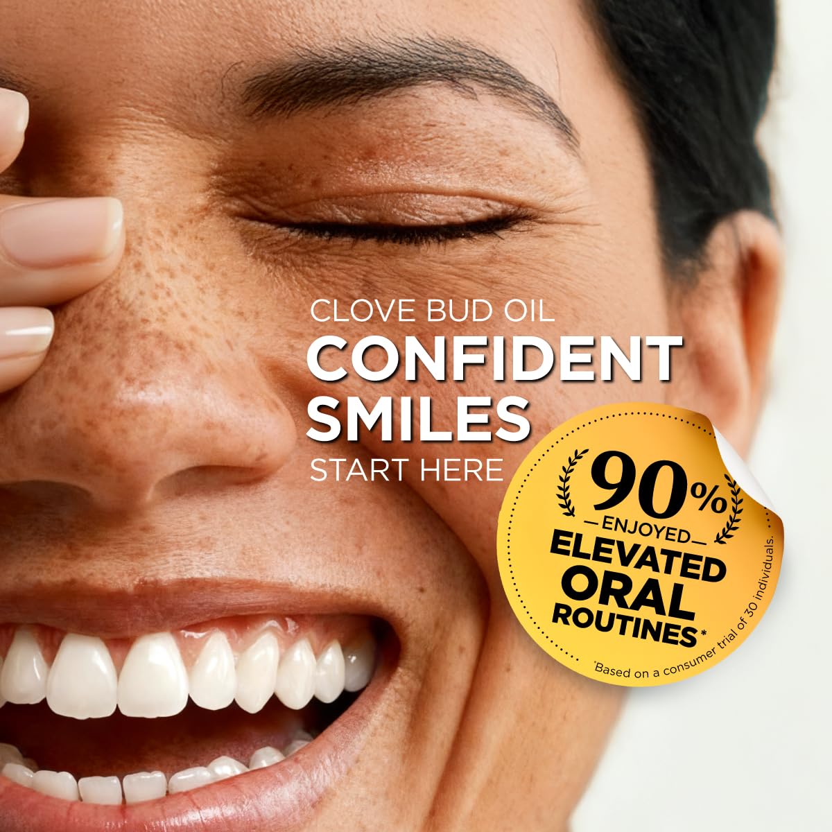 Gya Labs Clove Bud Oil applied to teeth and gums for oral care routines.
