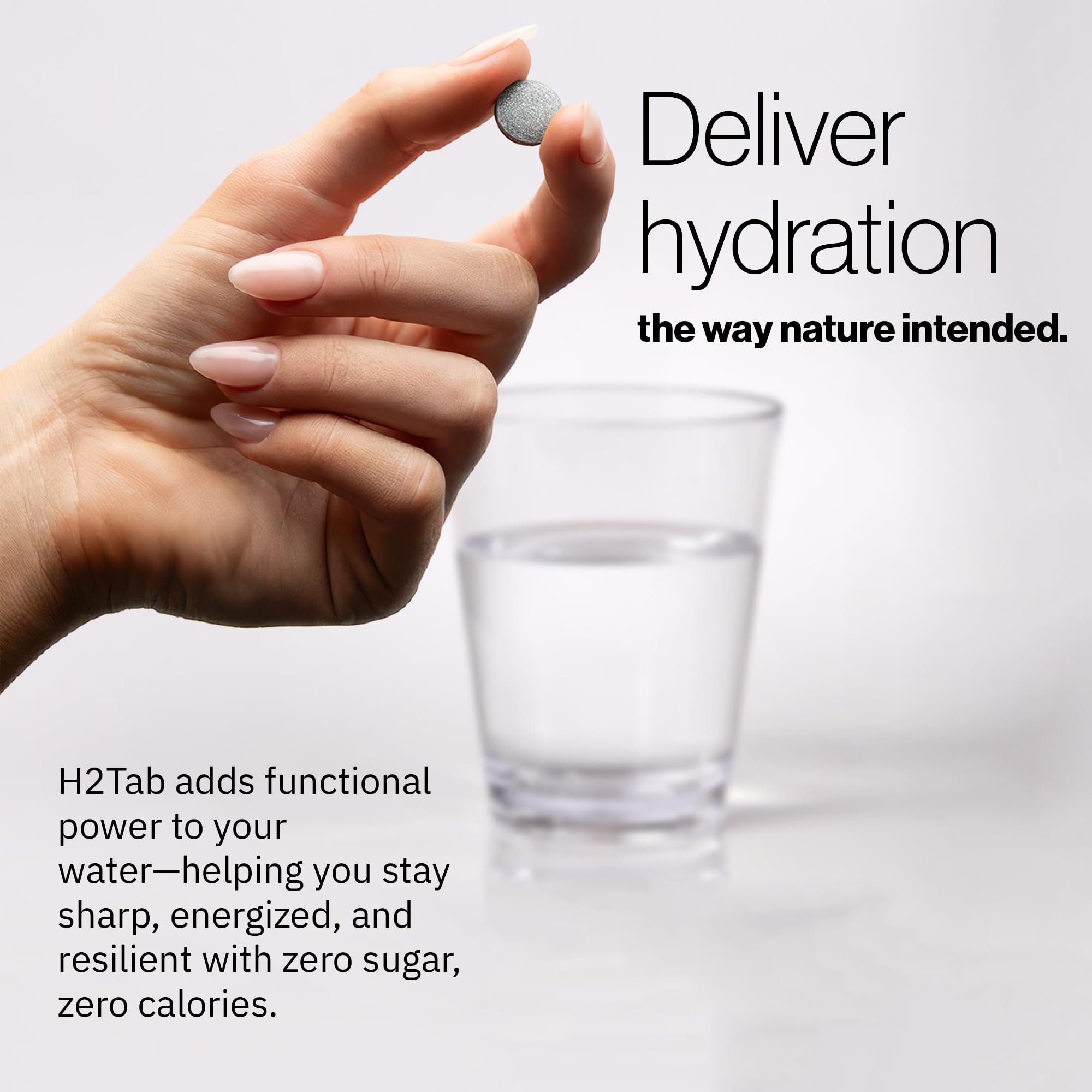 Glass with effervescent H2TAB water offering energizing hydration