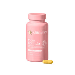HAIRtamin MOM prenatal bottle with one-a-day capsules for prenatal wellness.