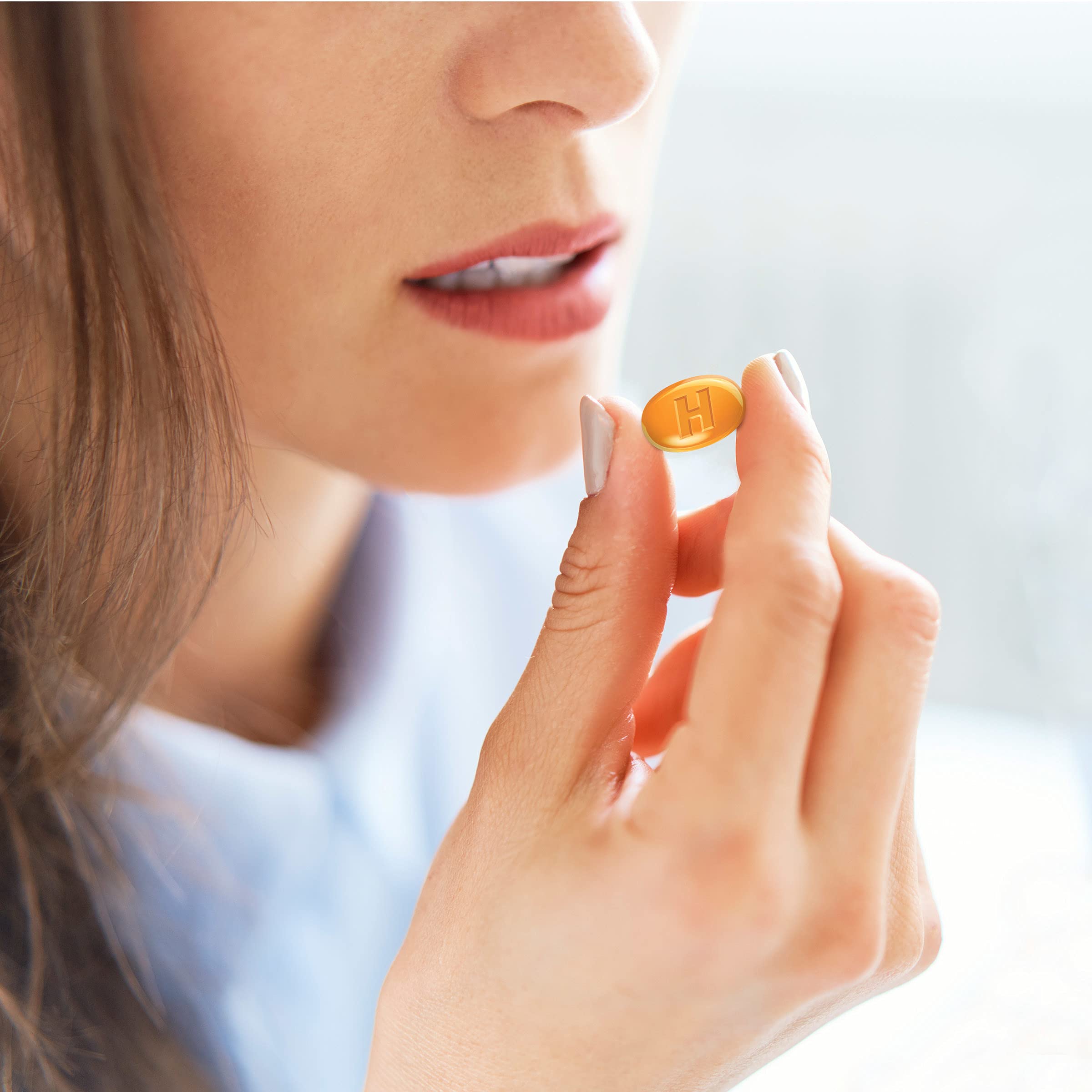 HALLS Defense drops in hand for easy daily dosing