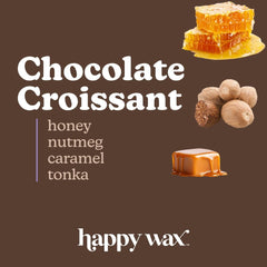 Happy Wax Chocolate Croissant candle closeup label highlighting premium essential oil infusion.