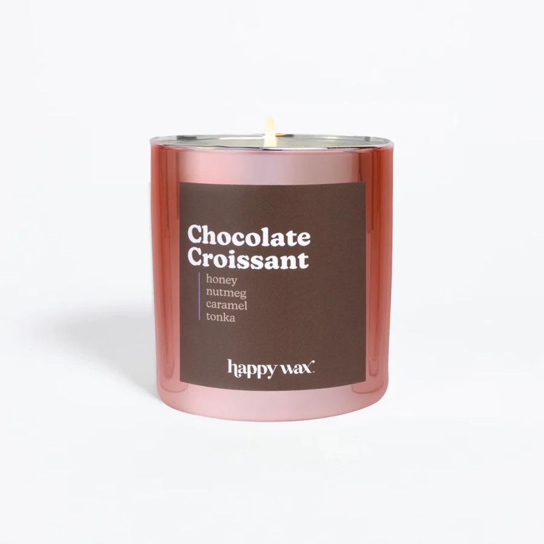 Happy Wax Chocolate Croissant candle in its jar, showcasing a warm bakery-inspired scent for cozy evenings.