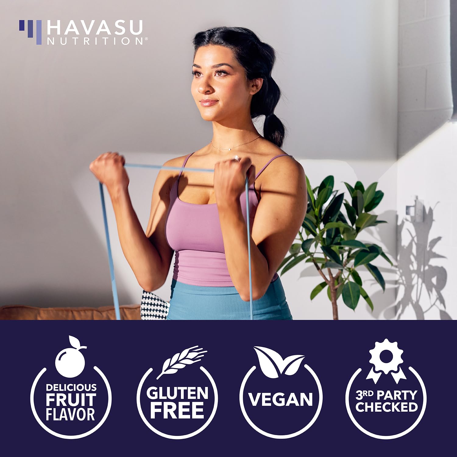 HAVASU Nutrition multivitamin gummies in hand for a convenient daily bite.