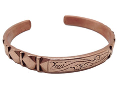 Healing Lama hand-forged copper bracelet front view highlights durable craftsmanship and warm patina.