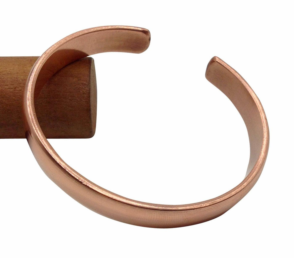 Healing Lama unisex copper bracelet worn on wrist for comfortable, snug wear.