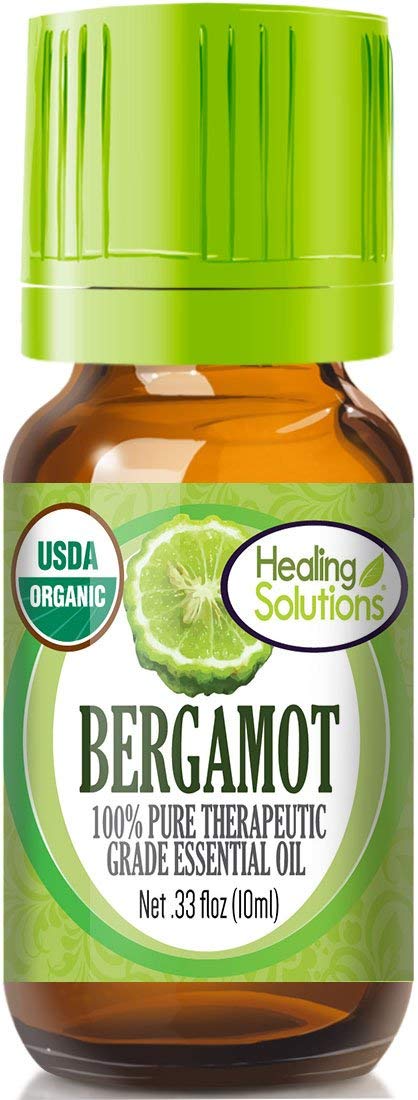 Healing Solutions bergamot oil bottle ready for diffusion, pure aroma for mood lift.