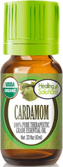 Healing Solutions Cardamom Oil bottle highlighting pure organic formula for skin and diffuser use.