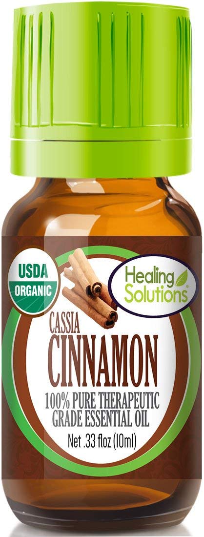 Healing Solutions Cinnamon Cassia Oil bottle offers pure aroma for cozy spaces.