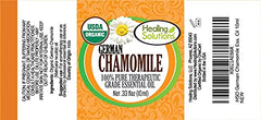 Healing Solutions German Chamomile oil label showing organic purity and batch testing