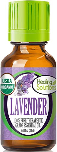 Healing Solutions lavender oil bottle demonstrates pure organic fragrance for relaxation and mood support.
