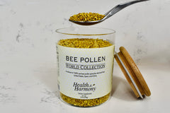 Health and Harmony World Collection bee pollen granules close-up, vibrant nutrients for energy.