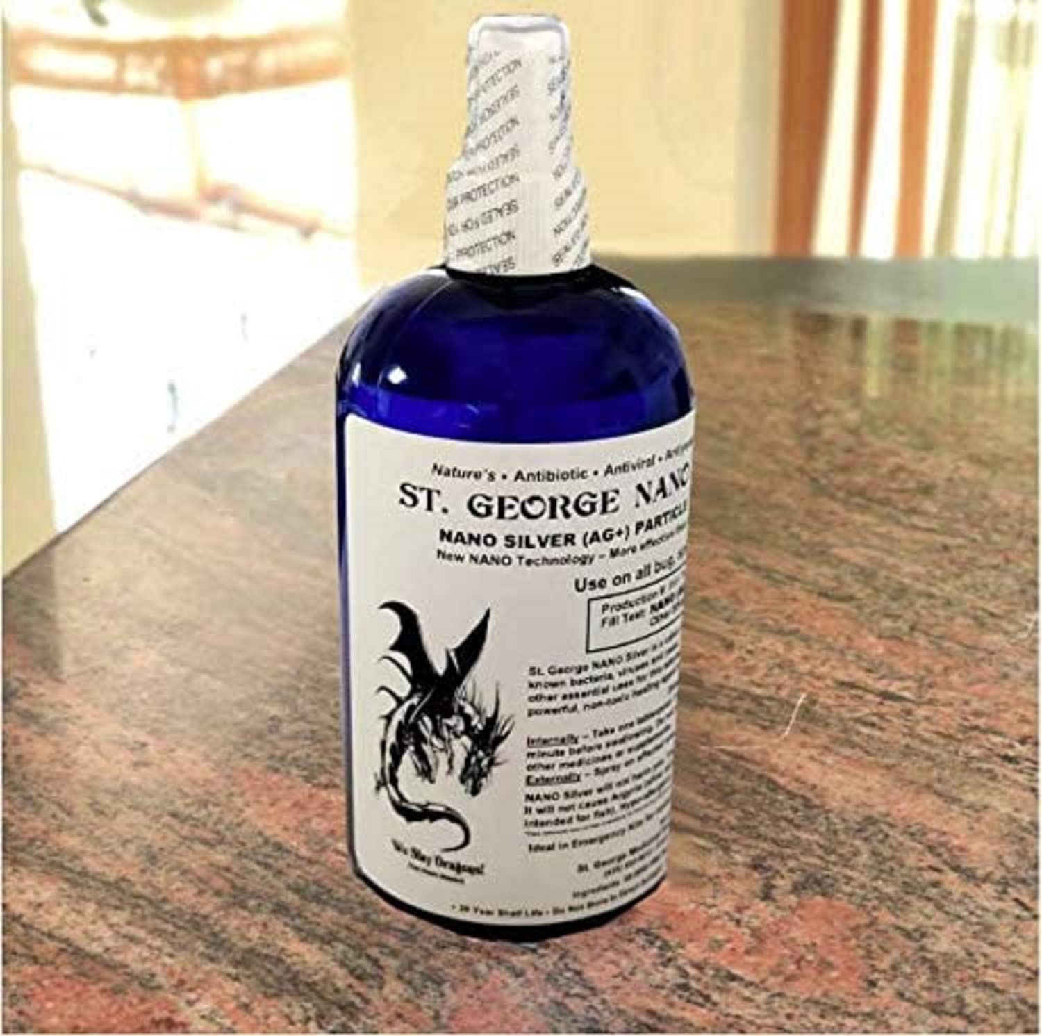 Close-up of Health and Med.com St. George Nano Silver liquid showing clarity and composition