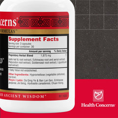 Health Concerns Isatis Gold capsules close-up, ready for daily use.