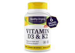 Healthy Origins softgel capsules resting on a surface for easy swallowing.