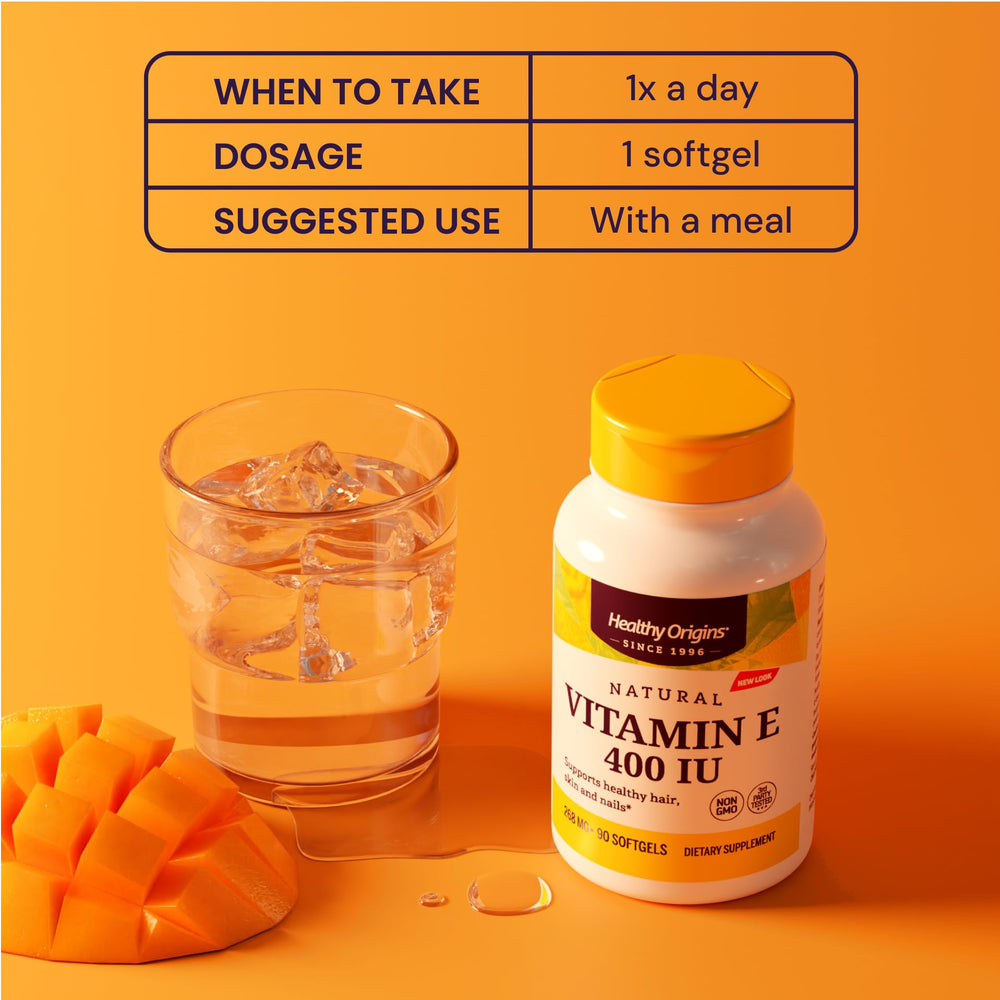 Healthy Origins Vitamin E 400 IU glass bottle on counter, gluten-free.