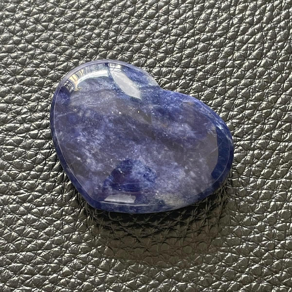 Heart Stones Healing Crystals Gift close-up texture of sodalite heart