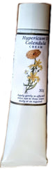 Helios Hypericum Calendula Cream tube being spread for smooth application