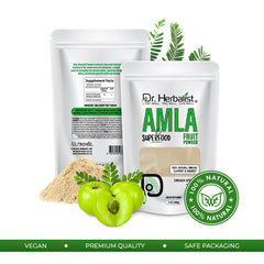 Hemani Amla powder being poured into a spoon for easy smoothies