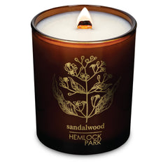 Hemlock Park Amber & Gold Wood Wick Candle jar with warm amber glow and subtle aroma.