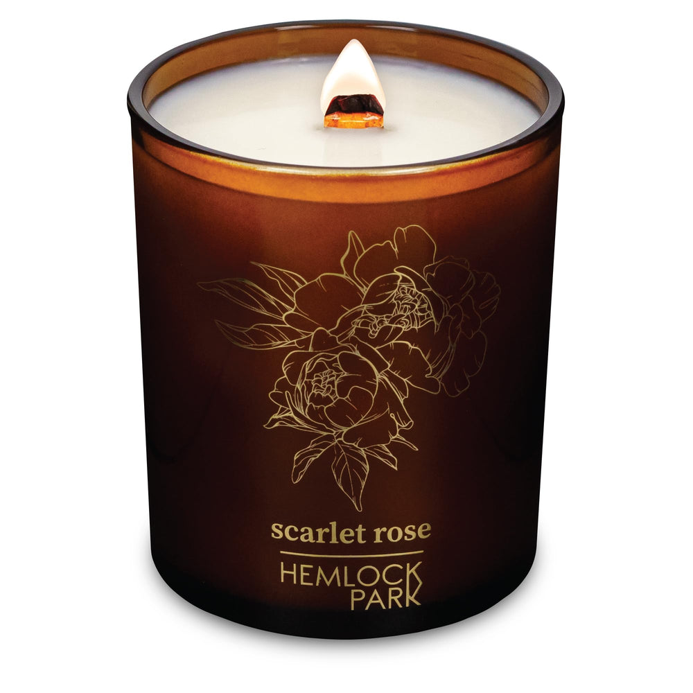 Hemlock Park Amber and Gold Wood Wick Candle closeup showing warm glow for cozy spaces using coconut wax