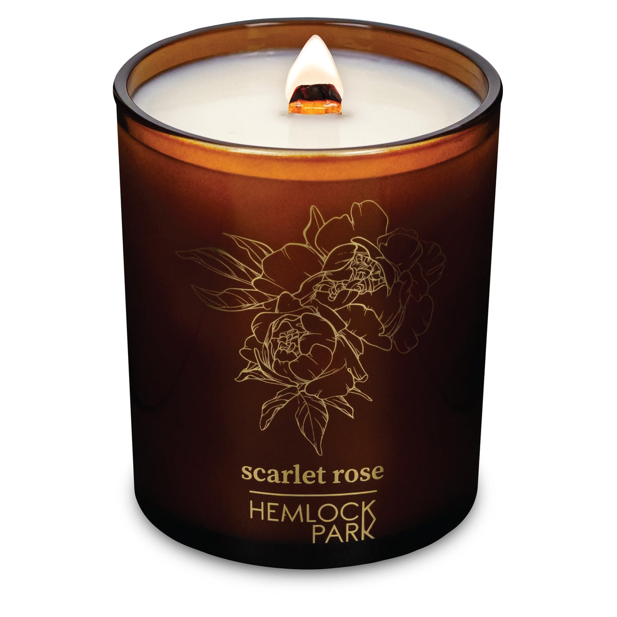 Hemlock Park Amber and Gold Wood Wick Candle closeup showing warm glow for cozy spaces using coconut wax