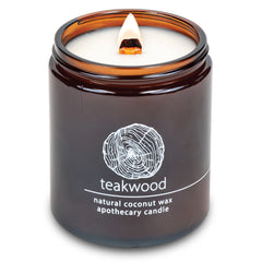 Hemlock Park crackling wick candle with teakwood aroma for cozy evenings.