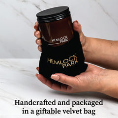 Giftable Hemlock Park lavender candle packaging with velvet pouch.