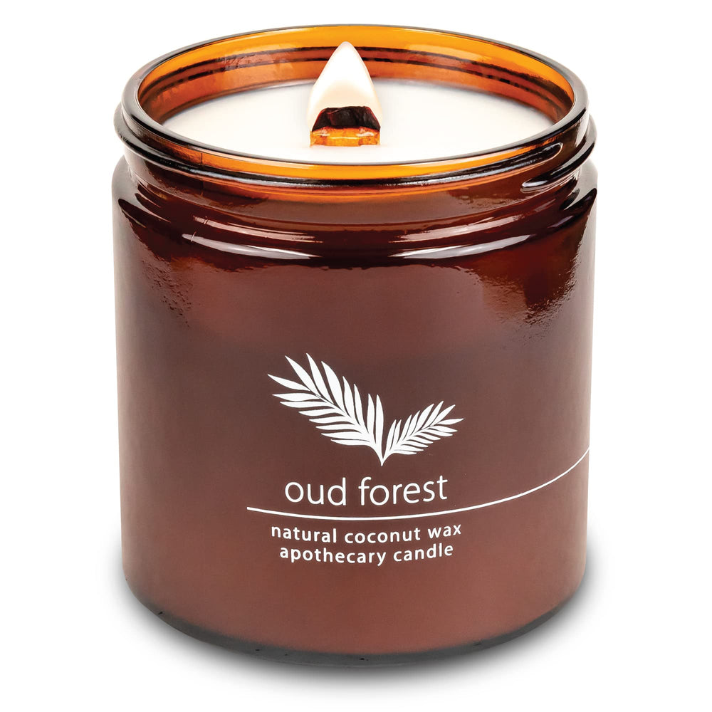 Hemlock Park Oud Forest candle emits a calming amber glow for a cozy fragrance ambiance