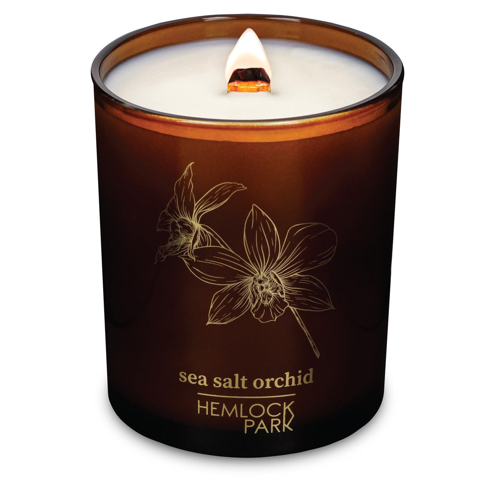 Hemlock Park Sea Salt Orchid candle jar closeup highlighting coconut wax for clean burning.